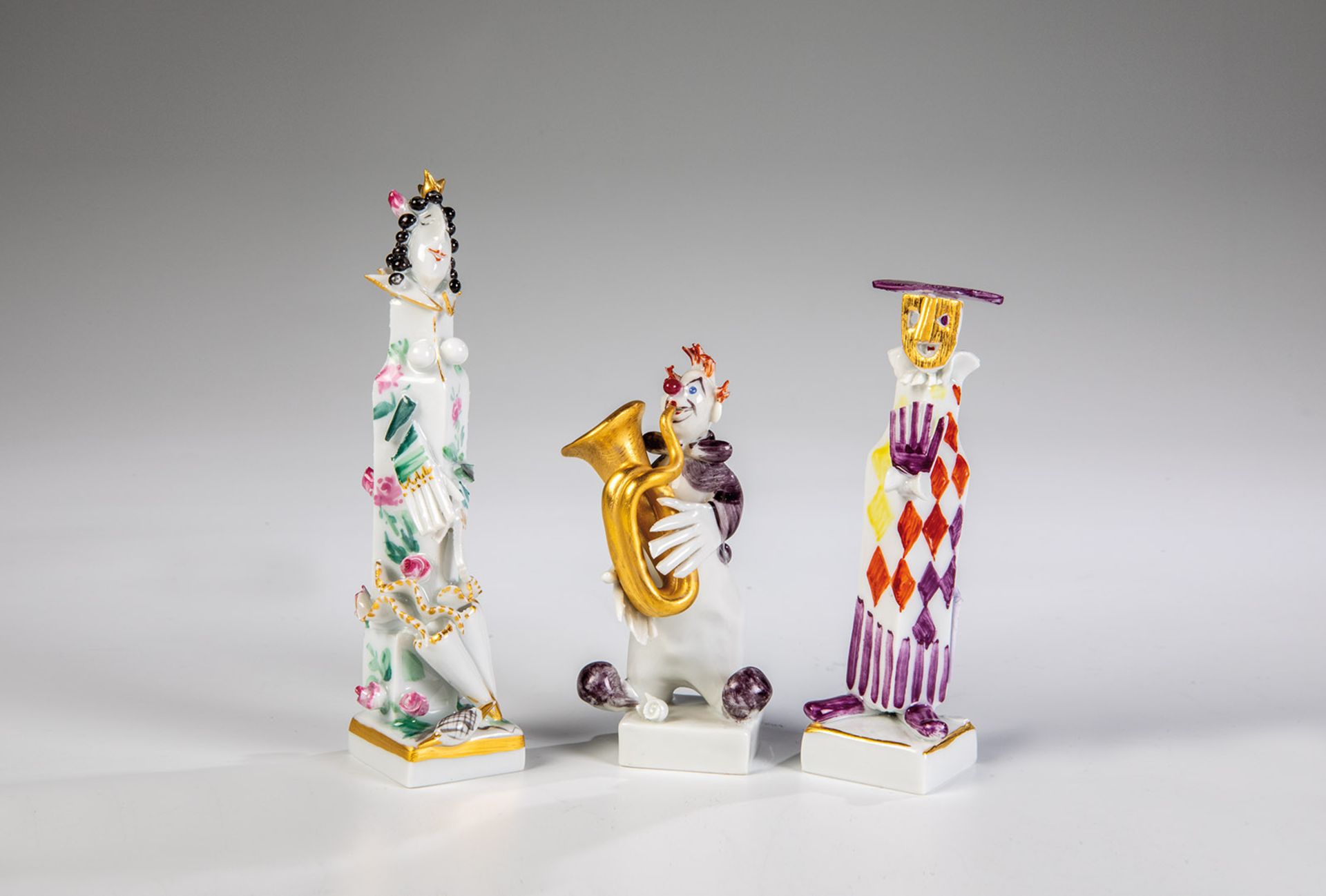 3 Miniaturfiguren aus den Serien "Maskerade", "Musikclowns" und "Märchenfiguren"