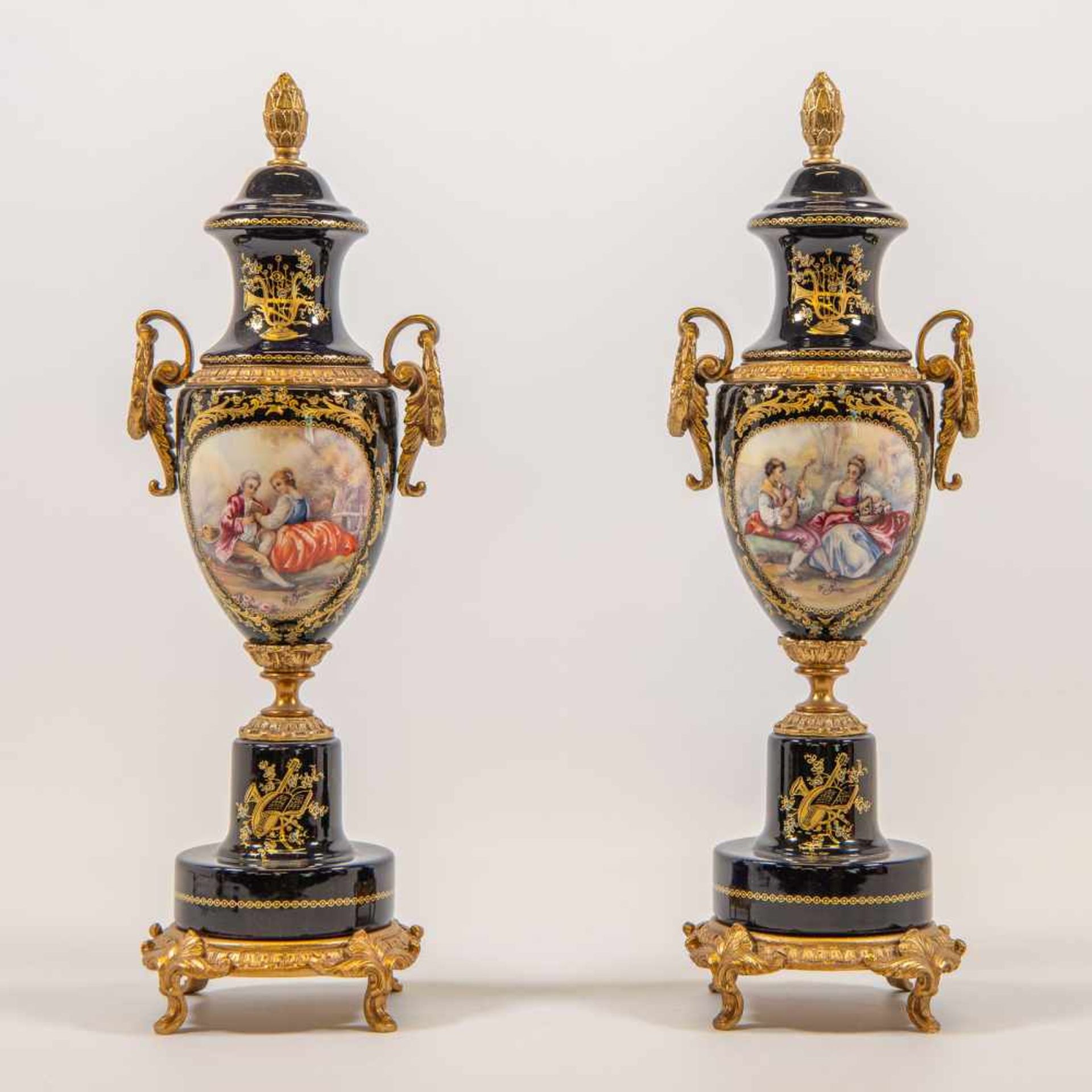 A.C.F. Decor de Sèvres, Pair of young vases, handpainted decor signed G. Rimi, bronze mounted.