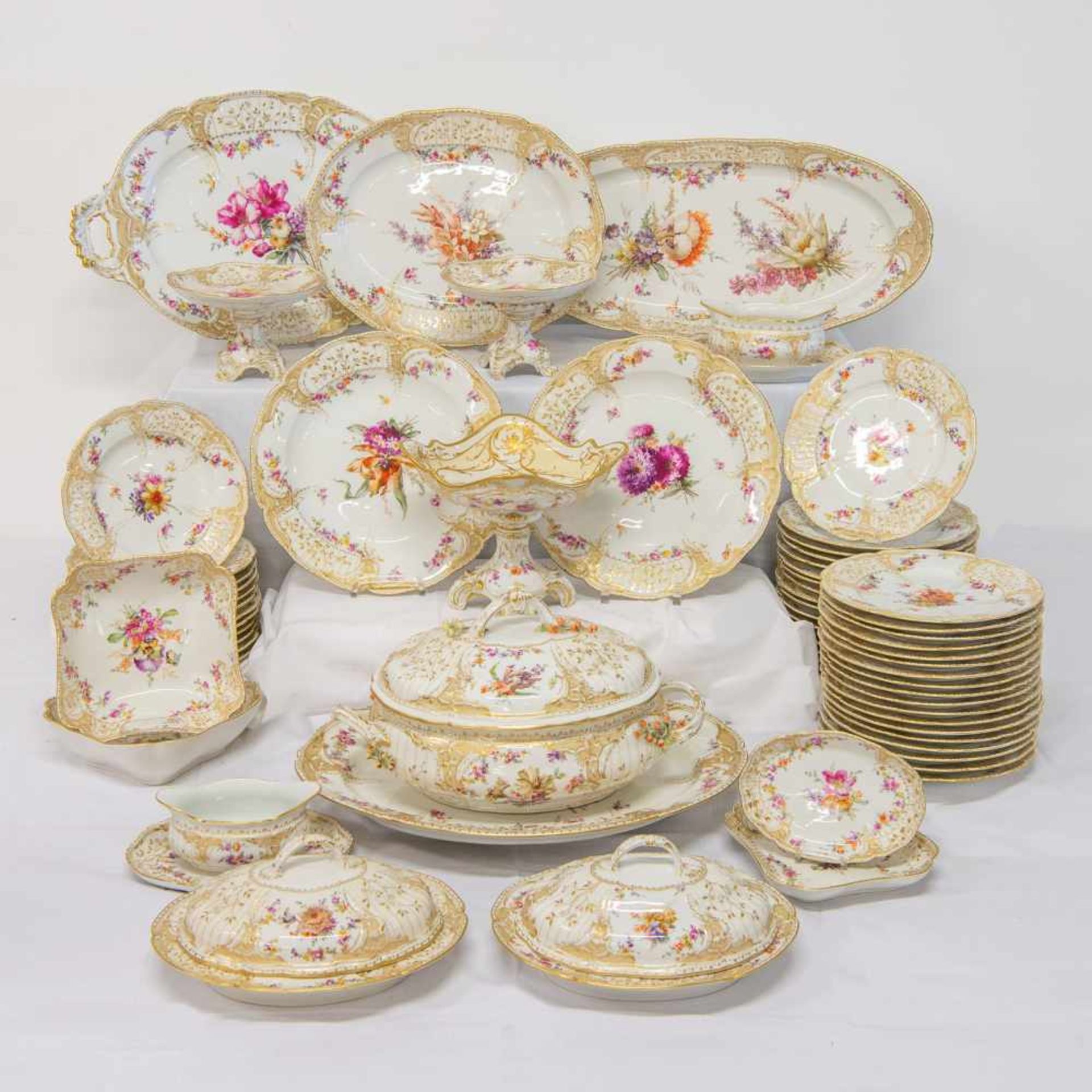 Exceptional dinner service of 66 pieces, handpainted decorations, Marked KPM. (1 small chip) Length: