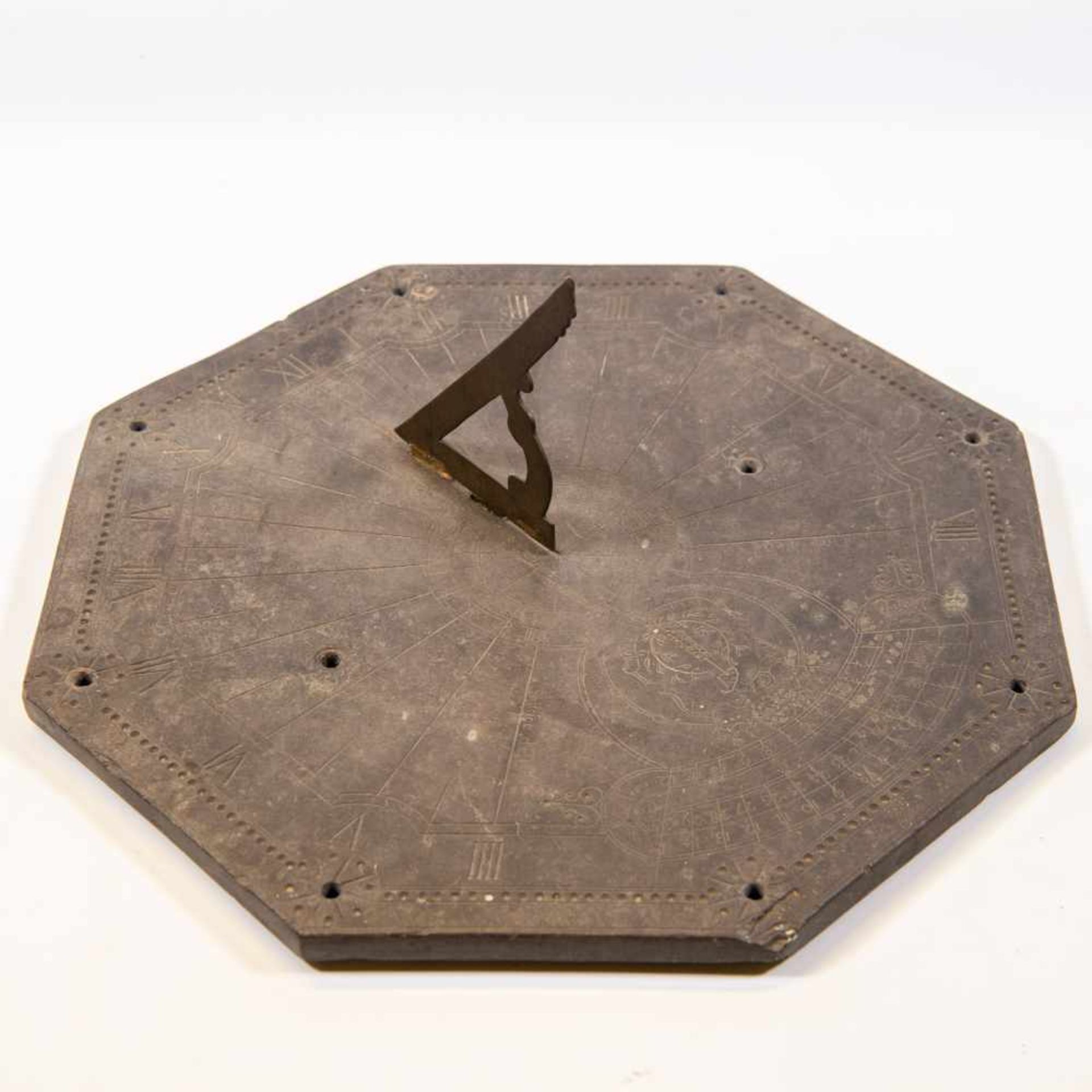 Slate rock sundial, 1798, engraved with latin: 'inuirom que fenor'. Lunar calendar. Length: 40