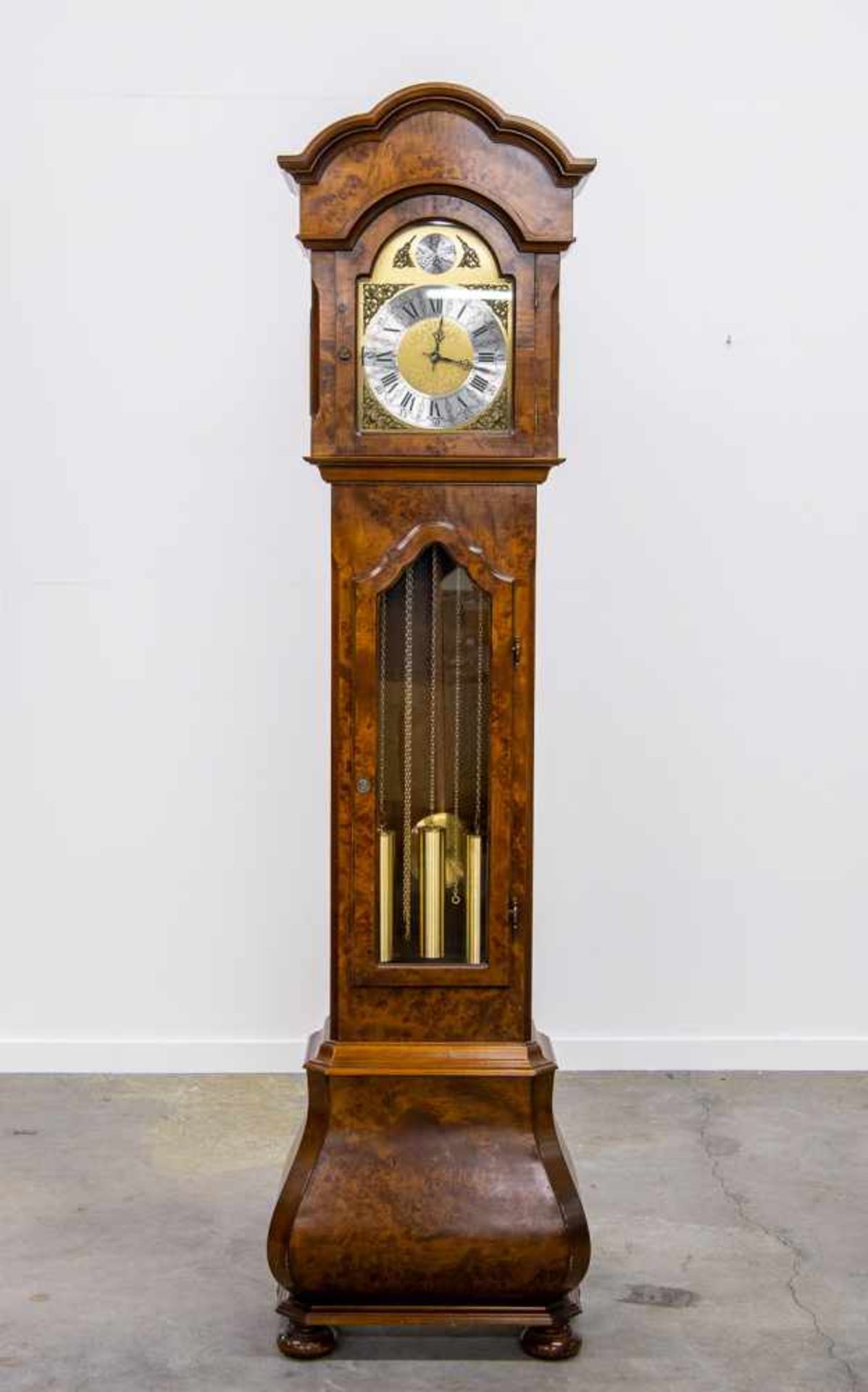Standing clock with Westminster Chimes, made from burl veneer. Made around 1970. Length: 57 cm ,