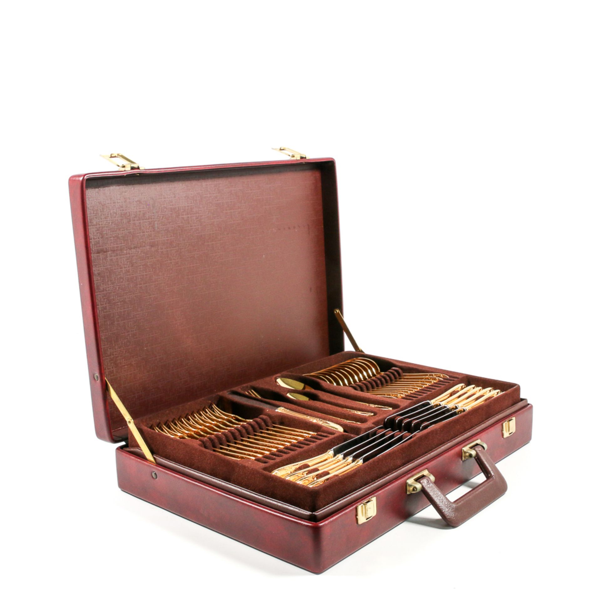 Suitcase with gold plated cuttlery