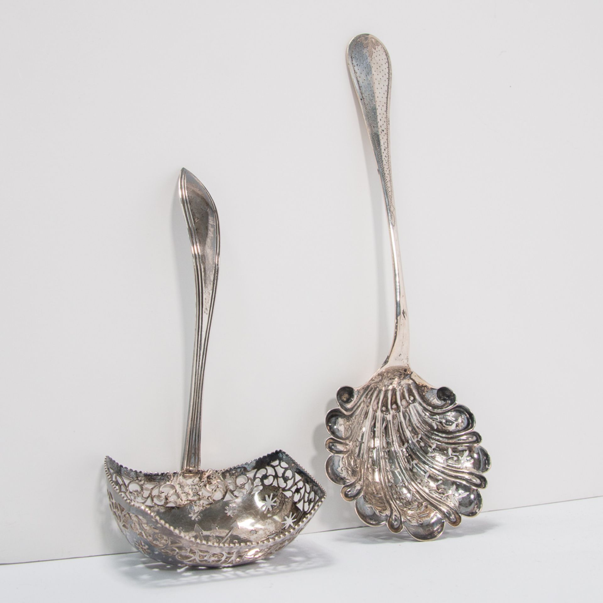 Pair of silver sugar casters