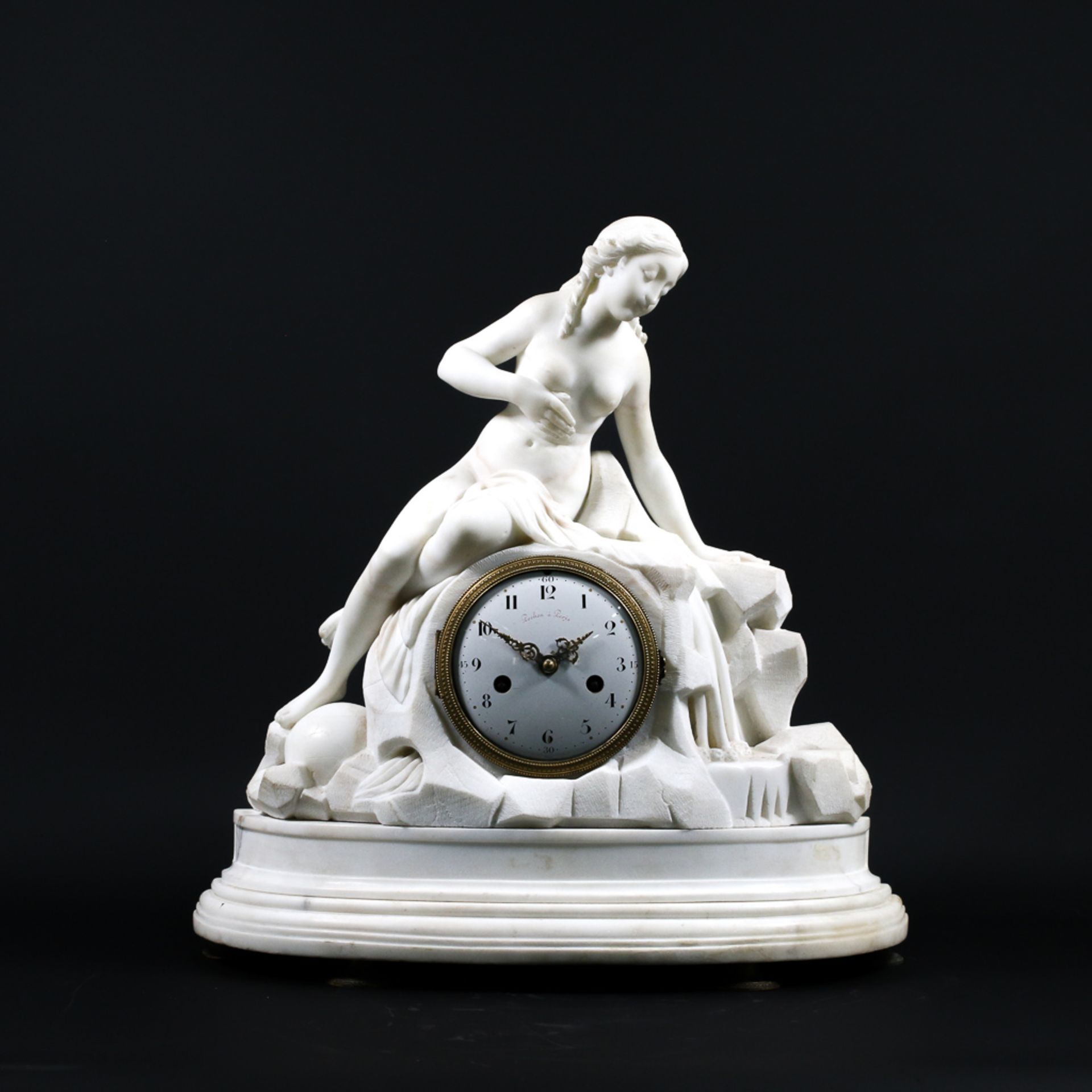 Clock made of white carrara marble