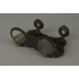 An Unusual Pair of Folding Binoculars,