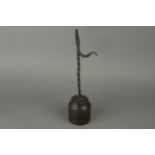 A Wrought Iron 18th Century Rush Lamp with Wooden Turned Base,