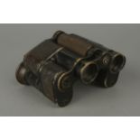 A Pair of Folding Negretti Binoculars,