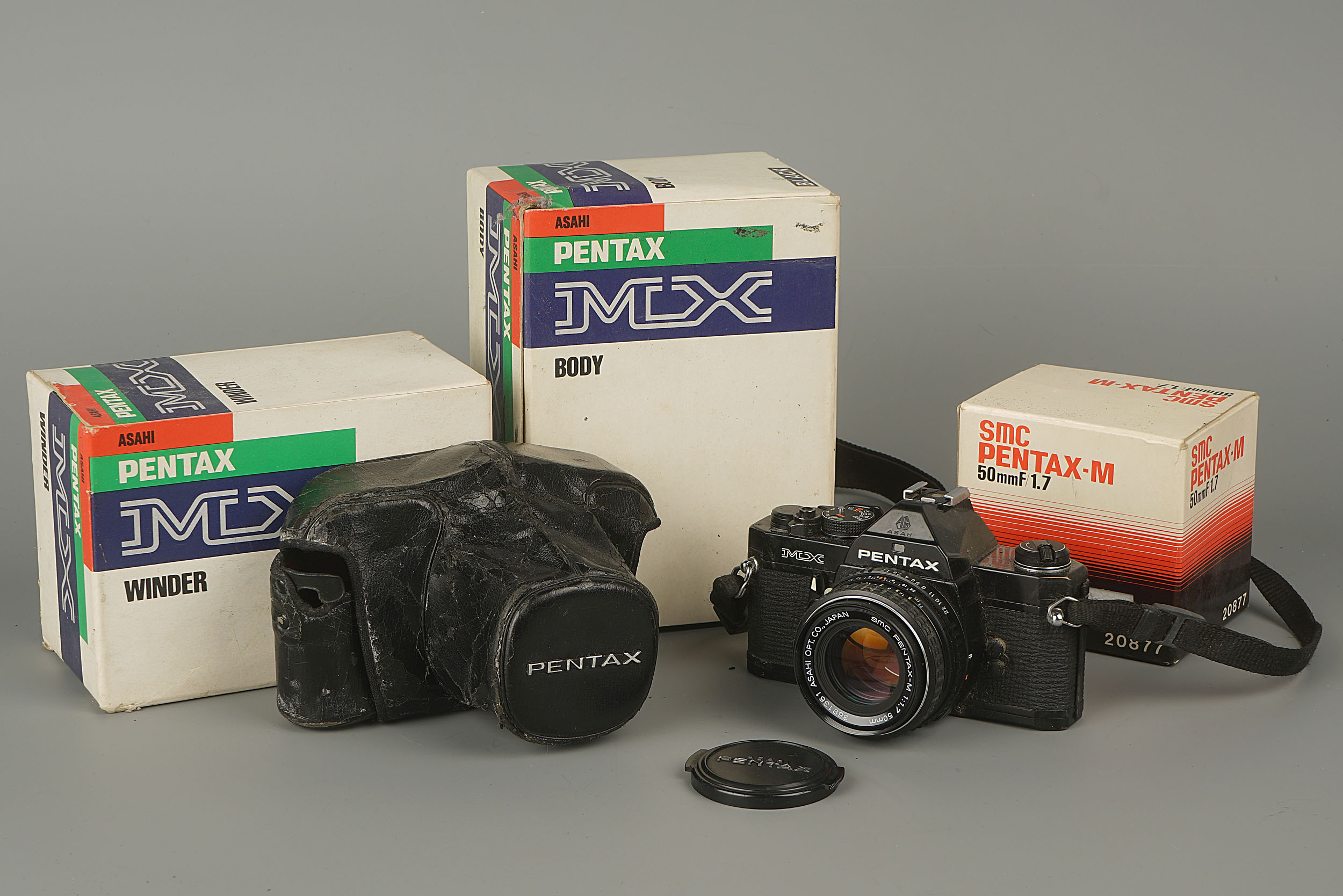 A Pentax MX SLR Camera,