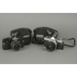 Two Olympus OM-2n SLR Cameras,