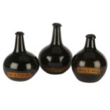 Three Bulbous Green Glass Apothecary Bottles,