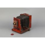 An Unmarked Half Plate Mahogany Field Camera,