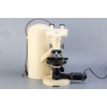 A Wild Heerbrug M11 Microscope,