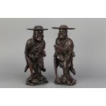 A Pair of Chinese Carved Rosewood Figures,