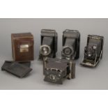 Four Folding Cameras,