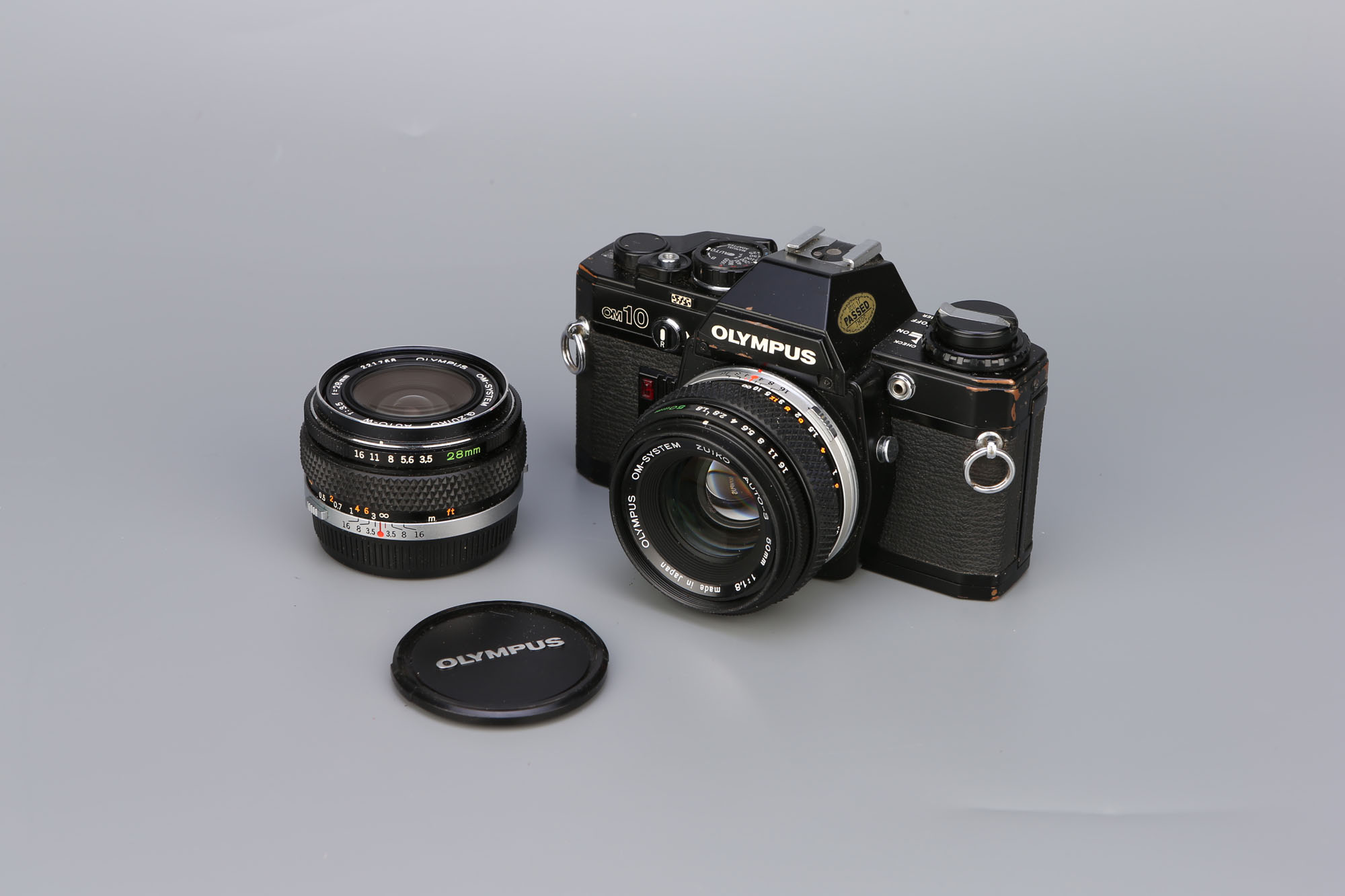 An Olympus OM-10 SLR Camera,