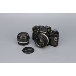 An Olympus OM-10 SLR Camera,