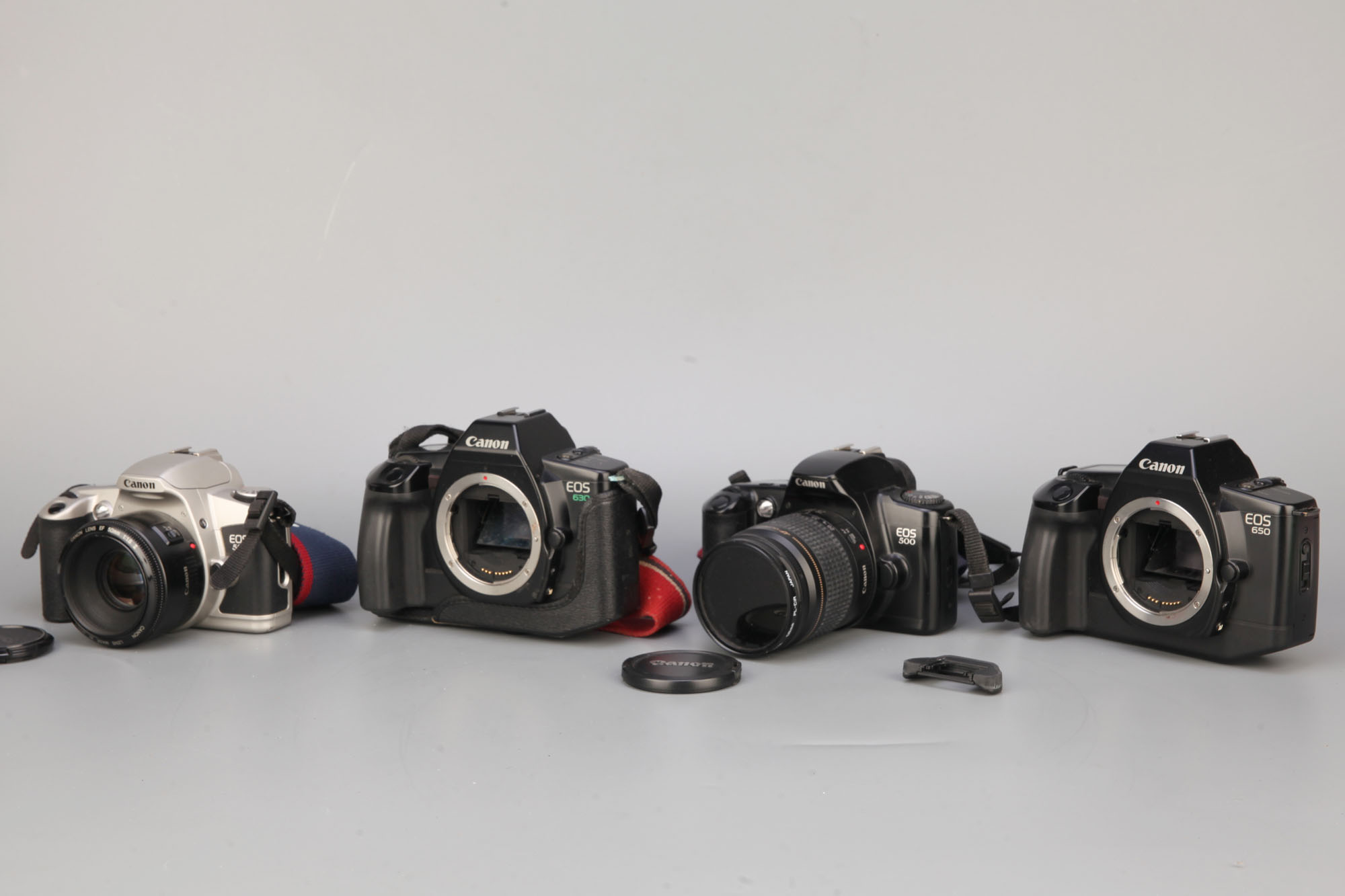 Four Canon EOS SLR Cameras,