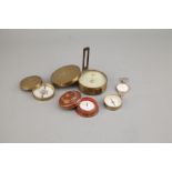 A Collection of Four Compasses,