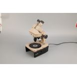 A Vickers Binocular Microscope,