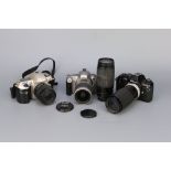 Three Nikon SLR Cameras,