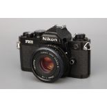 A Nikon FM2 SLR Camera,