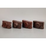 Four Leica Cases,