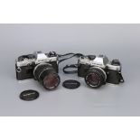 Two Olympus OM-10 SLR Cameras,