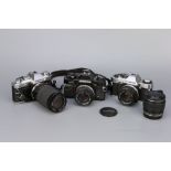 Three Olympus OM Series Cameras,