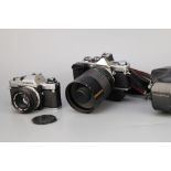 An Olympus OM-10 SLR Camera,