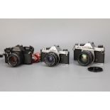 Three Pentax SLR Cameras,