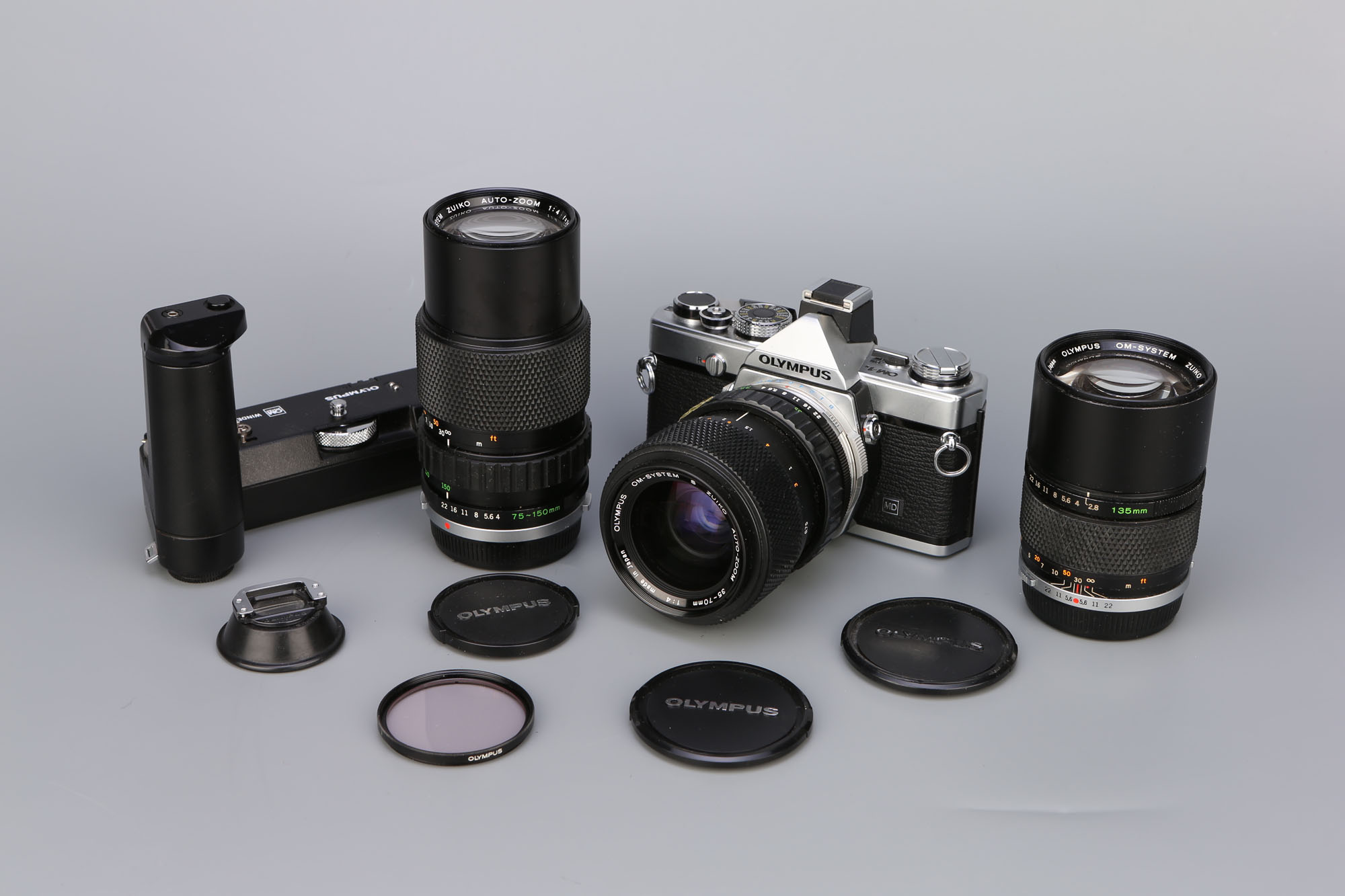 An Olympus OM-1n SLR Camera,