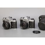 Two Pentax K1000 SLR Cameras,