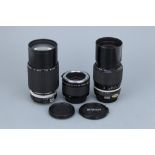 Three Nikon Lenses,