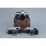 Two Olympus Trip 35 Compact Cameras,