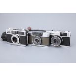 Three Compact Cameras,