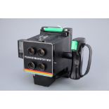 A Polaroid Mini Portrait Camera,