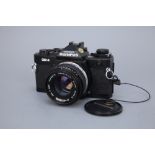 An Olympus OM-4 SLR Camera,