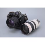 A Canon EOS 1 SLR Camera,