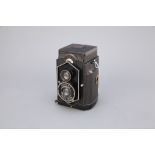 * A Zeiss Ikon Ikoflex 'Coffee Can' TLR Camera,