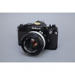 A Nikon FE SLR Camera,