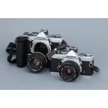 An Olympus OM-1n SLR Camera,