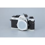 A Nikon FM2n SLR Body,