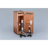 Two Cased Student Microscopes,