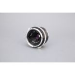 * A Carl Zeiss Tessar f/2.8 50mm Lens,