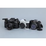 Three Nikon SLR Cameras,