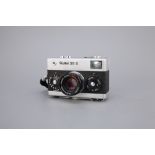 * A Rollei 35S Compact Camera,
