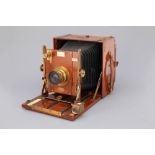 A Sanderson Tropical Hand & Stand Camera,