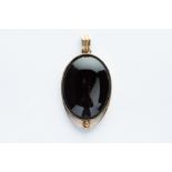 A 9ct Yellow Gold Mounted Black Onyx Pendant,