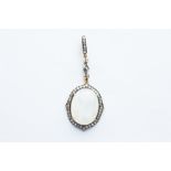 A Silver Gilt Moonstone & Diamond Pendant,