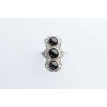 A Platinum Diamond & Onyx Ring,